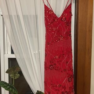 Stunning Red Backless Dress with Floral Accents